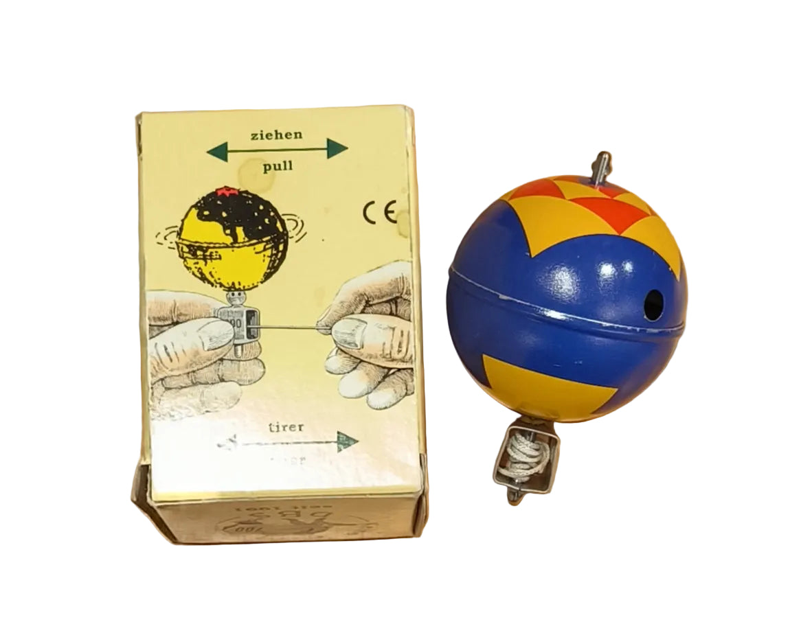 Toupie chantante à ficelle – DBS – 7,5 cm