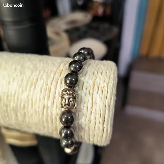 Bracelet en hématite avec perle centrale Bouddha